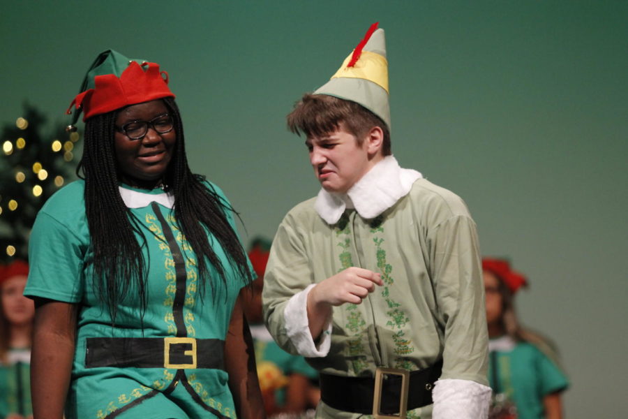 Senior Kendra Washington and sophomore Austin Wright perform the beginning of Elf Jr. The Musical during their dress rehearsal.