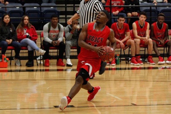 Trevone Fuller, 12, plays in the Spring Creek Basketball Tournament on Nov. 30. 