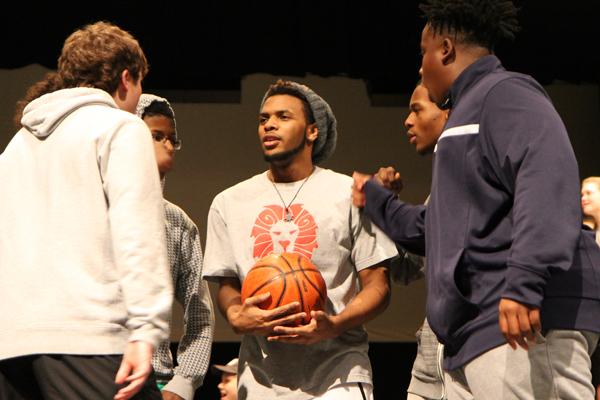 Michael King, 12, rehearses Get Your Head in the Game with the cast.