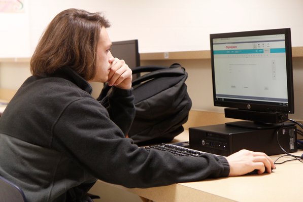 Thomas Stalnaker, 12, works in Online Credit Recovery.