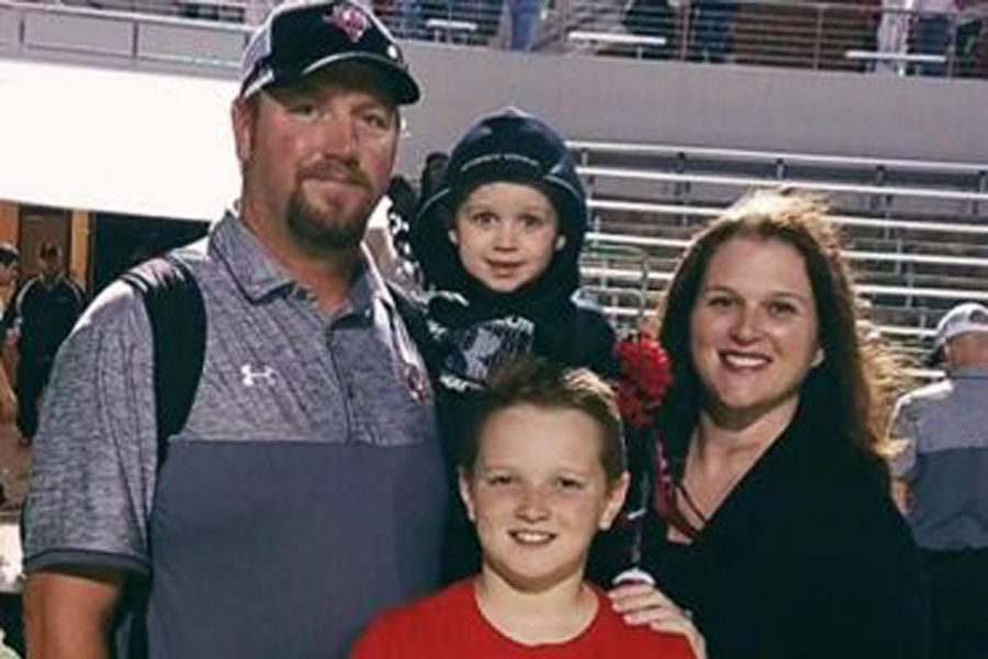 Amanda Ferguson and her family take a picture after a football game. Amanda was diagnosed with a rare form of cancer before school began, and was honored in Legacys annual LUCK (Legacy United in Caring and Kindness) week, and over $10,000 were raised to help pay for bills and expenses. Courtesy Photo. 