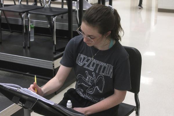 Brittyn Sutton, 12, practices her All State music. 