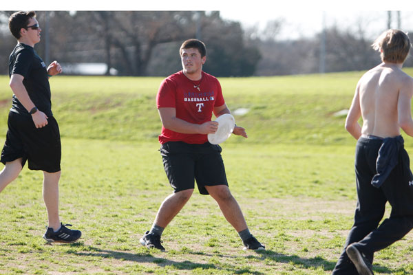 Jake Stacks, 12, searches for a teammate to pass the frisbee to during the Ultimate Frisbee Clubs first match that took place on Mar. 2. 