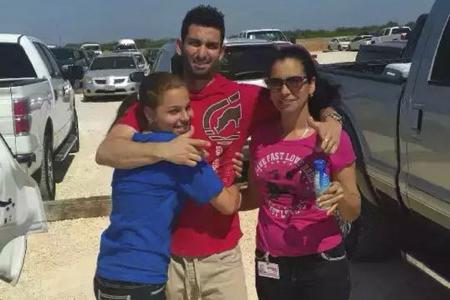 Sophomore Surisaday Sanchez reunites with her family. 