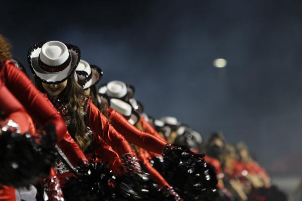 Members of the 12th line of Legacys Drill Team, the Silver Spurs, bow as a part of their football game performance. This teams final performance will take place on April 21, and will usher in a new age: the 13th Line.