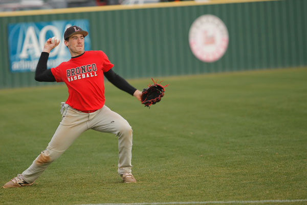 Nathan Rooney, 11, throws the ball during the Broncos' match against Seguin on Feb. 16. 