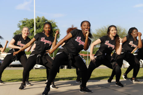 Tyjazhane Love, 11, and other drill team members dance at the Westside Picnic. Drill team danced to two different songs for everyone who went to the picnic. (Kassidy Duncan photo)