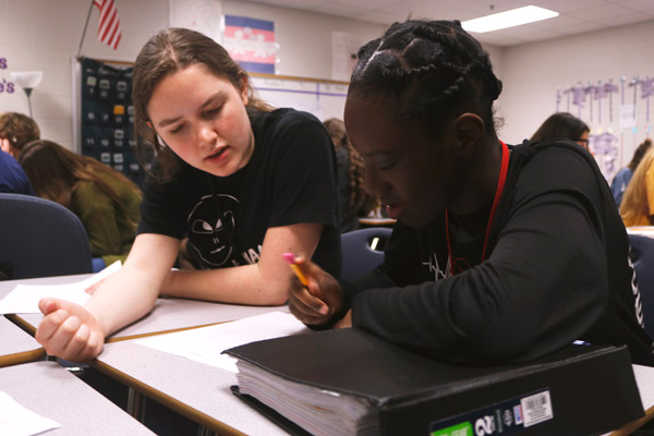 Helen Baker, 11, tutors Ms. Teagues Algebra I class about exponents. Students in this class prepare for the upcoming Algebra I EOC on May 7. (Cooper Certain photo)