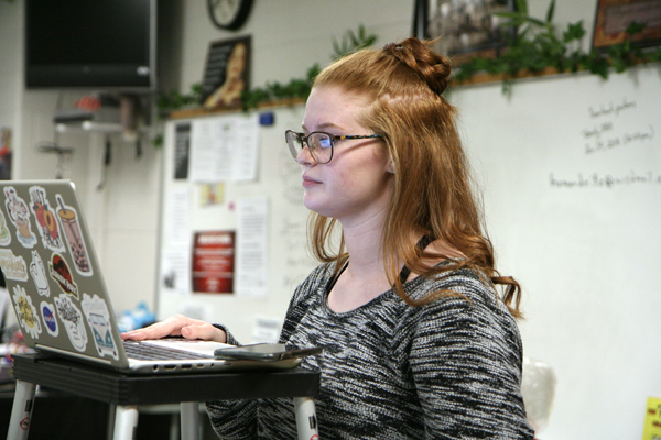 Kylie Moretz, 11, presents her case on mental health in schools and careers for a debate tournament.