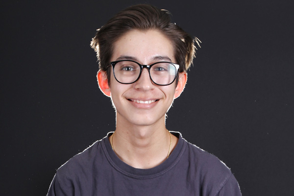 Phillip Ipock, 12, poses for a photo in the studio. 