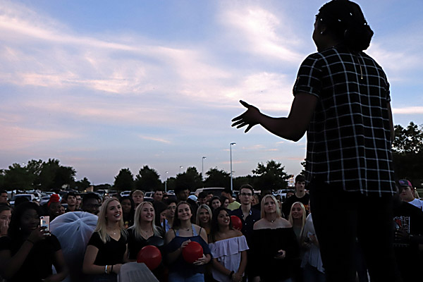 Senior Class President Ayo Abiara, 12, speaks to seniors about the importance of making the most of their last year of high school. (Seth Miller photo)