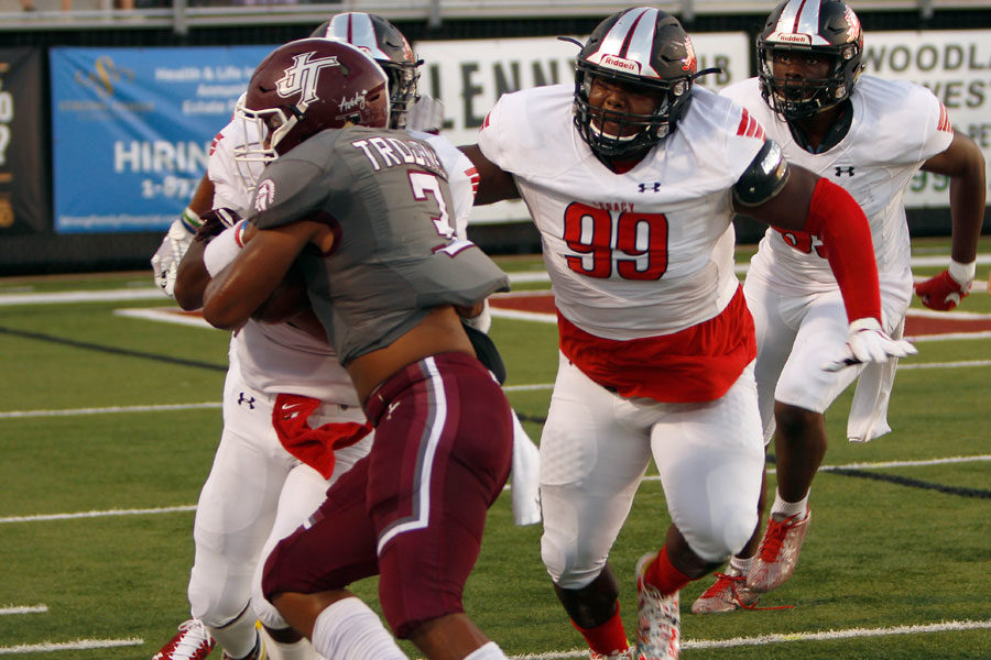 Enoch Jackson, 12, runs toward the ball carrier during the Border Brawl.