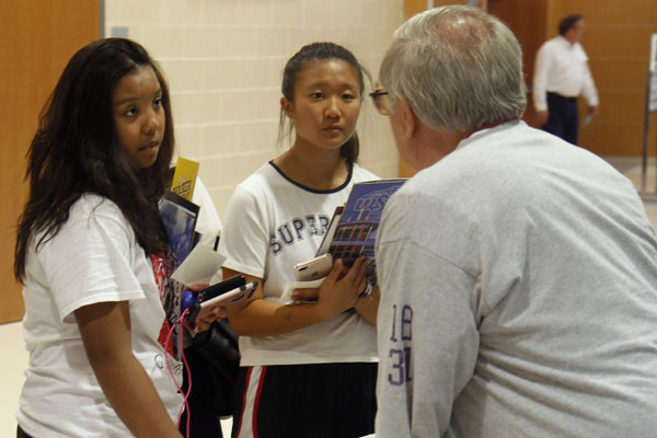 At the 2017 college and career night, Leah Nguyen, 11, and Yunah Song, 11, speak to a college representative. The 2018 college and career night event is scheduled for Oct. 29.