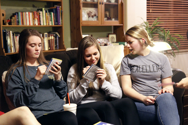 Ellie Brutsché, Jazmine Necessary and Kassidy Duncan, 12 play a game while hanging out. 