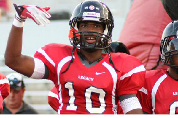 Marchie Murdock, 2013 Alumnus, runs out of the tunnel before a game. He is now a free agent in the NFL.