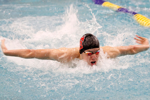 Eric Stelmar, 11, competes at a swimming meet