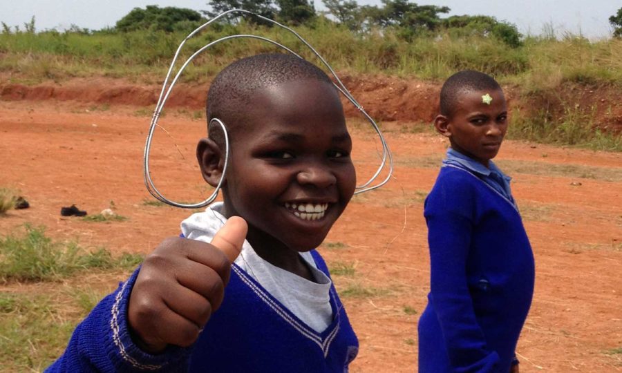 Alex Smith, 10, plays in Uganda as a child during school. Smith moved to the U.S. in 2011.