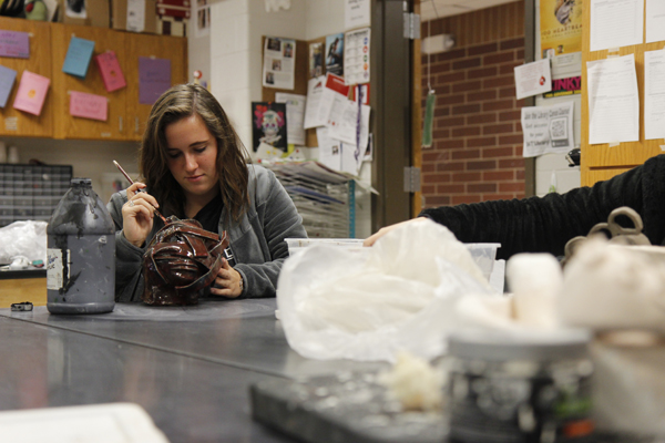 Makenna Jones, 12, works on a project in Ceramics class. Jones joined ceramics 