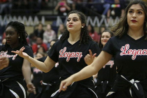 Christine Holley, 11, performs during the Homecoming pep-rally.