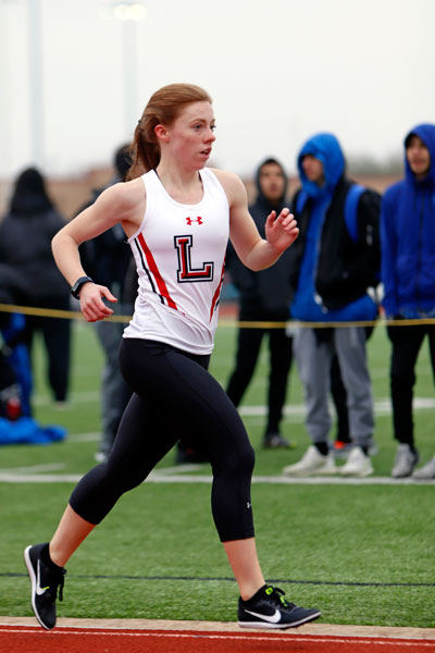 Alycia Steenbakkers, 12, runs in the 3200 m race at the Bronco Relays on Feb. 16. (Seth Miller photo)