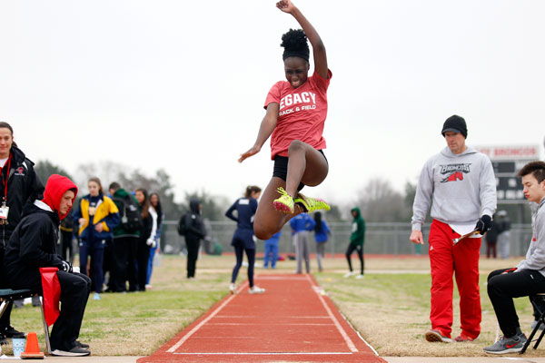 Ife+Adewusi%2C+11%2C+jumps+in+the+long+jump+competition.+%28Conner+Riley+photo%29