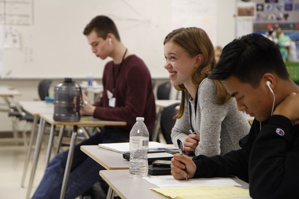 In Mr. Davis room, juniors  Megan Novak and Justin Pham study for the state competition.