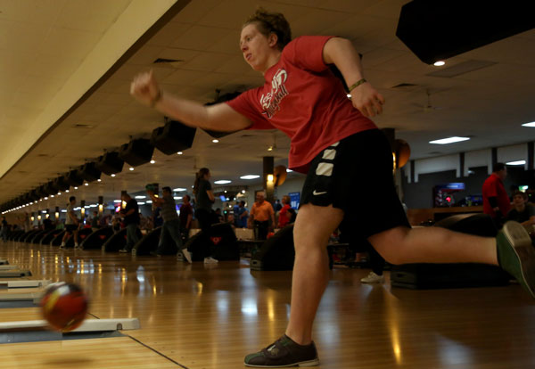 Brandon Oldham, 12, practices his bowling.