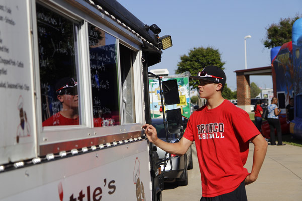 Landry Parlin, 10, buys food at the Westside Picnic in 2018. The fourth annual picnic will be on April 16. 