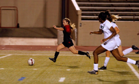 Brigid Murray, 12, dribbles the ball toward the goal in the playoff game against Birdville. 