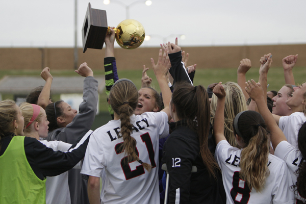 The girl's soccer team celebrates after winning the regional game. The team will play in the state semi-finals on April 18 at 12 p.m.