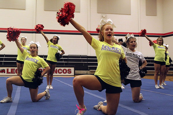 Claire Wisdom, 10, poses during rehearsal. Cheer placed seventeenth in the UIL Spirit Group competition.