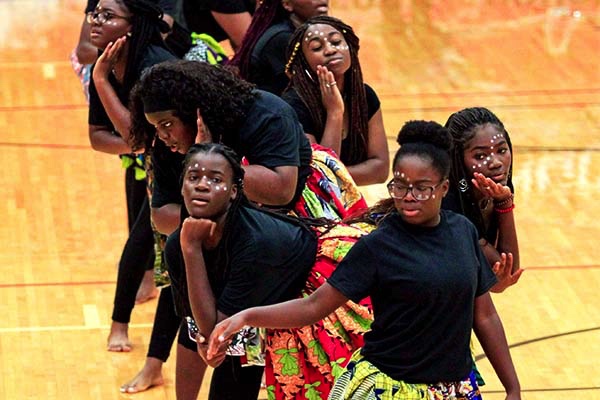 African Student Union performs at the Black Out pep rally. Tracy Adu (second from the front) danced during the event. 