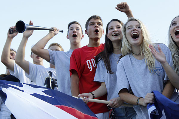 Students show school spirit during the Border Brawl football game against the Jenks Trojens. Yeary expresses concern that school choice would discourage school spirit and extracurricular involvement.  