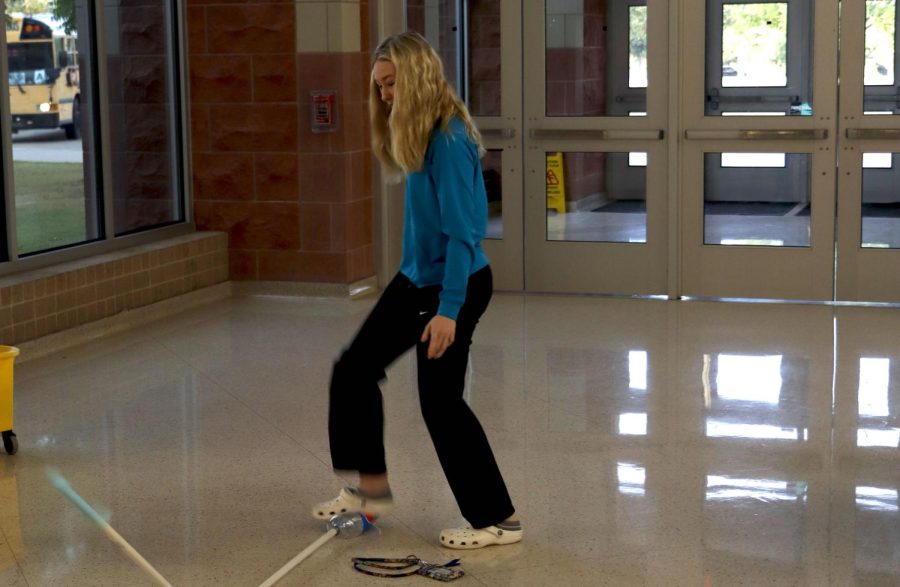 Jessica Aldridge, 11, participates in the catapult lab in Physics.