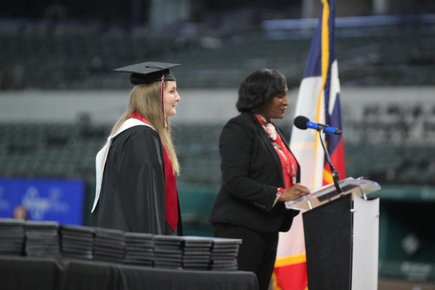 Caroline Brown, 2021 Valedictorian, stands beside Dr. Shelly Butler in preparation at the graduation ceremony on June 2. [File Photo]