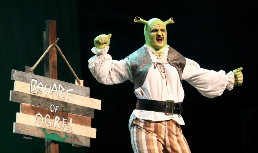 To finish out the song Big Bright Beautiful World, Danny Wall, 11, who plays Shrek, dances during tech night Jan. 20.