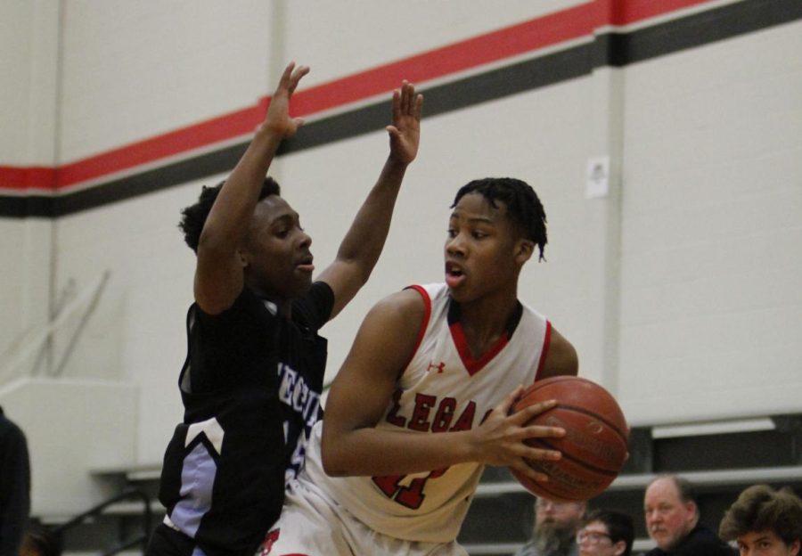 Junior Braylen Smith looks to pass the ball in the game against Seguin on Feb. 8. [File Photo]