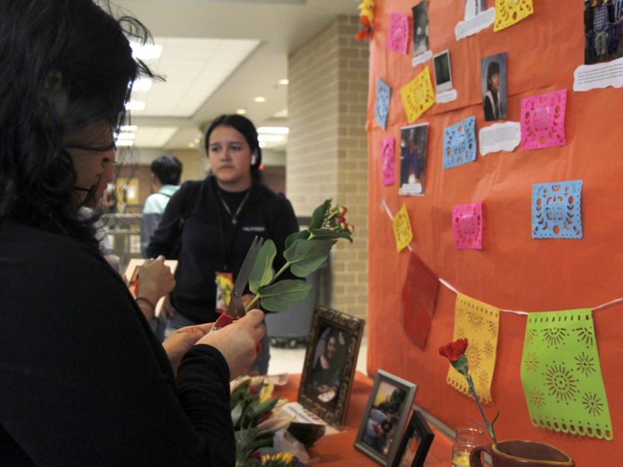 The Latin Diversity Union prepared altars on all three floors for students and staff to hang photos of loved ones in rememberance.