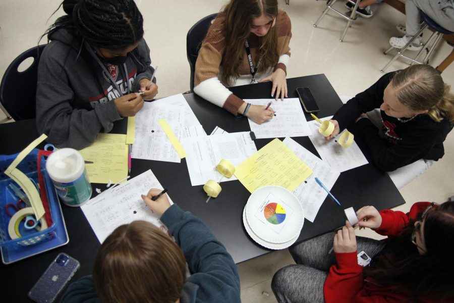 Students work on a lab in biology. Credit Recovery helps students with excessive absences or low grades to recover missed credits in order to  graduate on time or move on to the next grade level. [File Photo]
