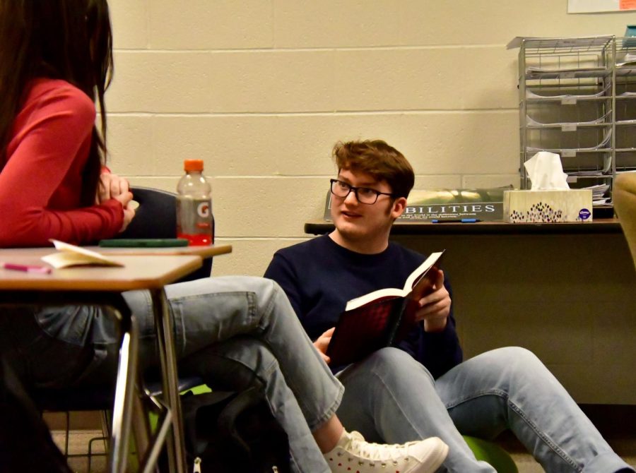 Sophomore Jacob Hillis discusses The Resting Place in book clubs weekly meetings after school every Thursday.