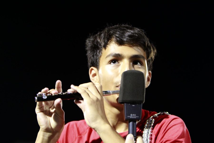 Cuauhtemoc Rameriez, 12, solos on his piccolo during the bands halftime performance. The band played Skyrush at the last football game.