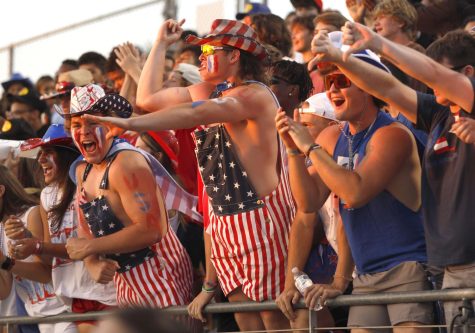 Seniors Cody Busocker-Klein, Brandon Sticka and Walker Ballard dressed in USA apparel, cheered for the football team at the game against Mansfield. 