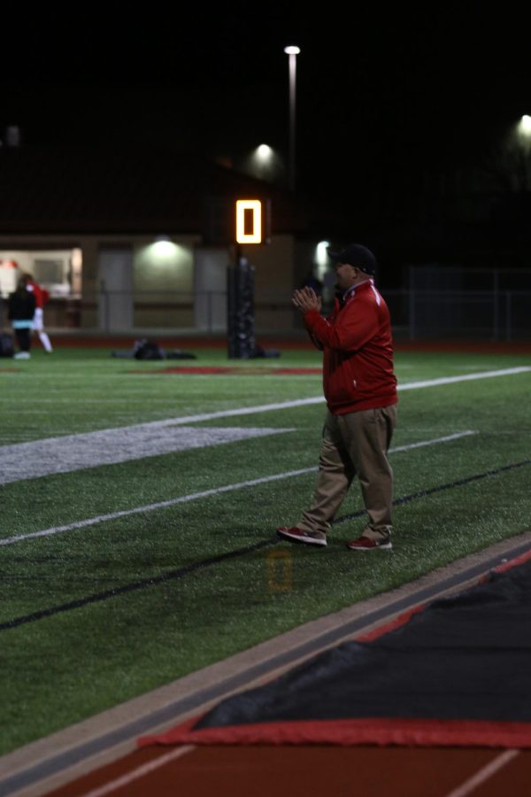 Coach Micheal Keel coaches his soccer team from the sidelines in the Feb. 2, 2016 game against Seguin High School. The team lost, 2-1. [File Photo]