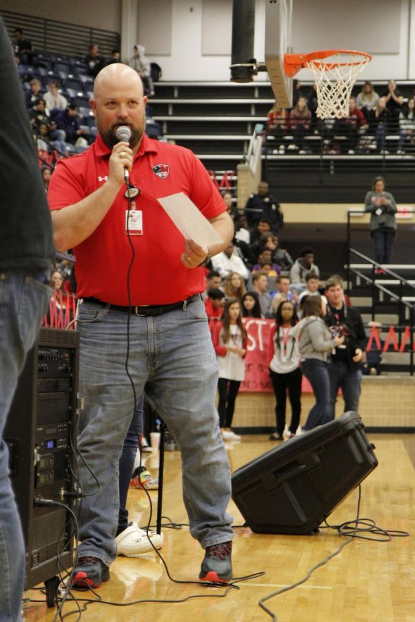 Coach Micheal Keel announces players at the Red Out Pep Rally on Jan. 24, 2020. [File Photo]