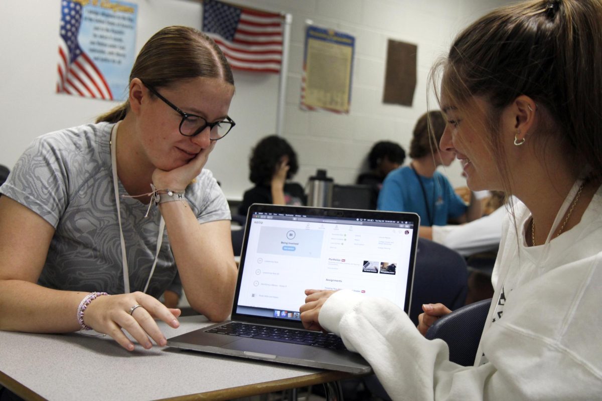 Cami Jones and Addison Breitenstein, 11, work through assignments on Xello during advisory on Sept. 26. Students complete SEL and future-readiness assignments during advisory, and have the opportunity to work on homework and missing assignments when all assignments are complete.