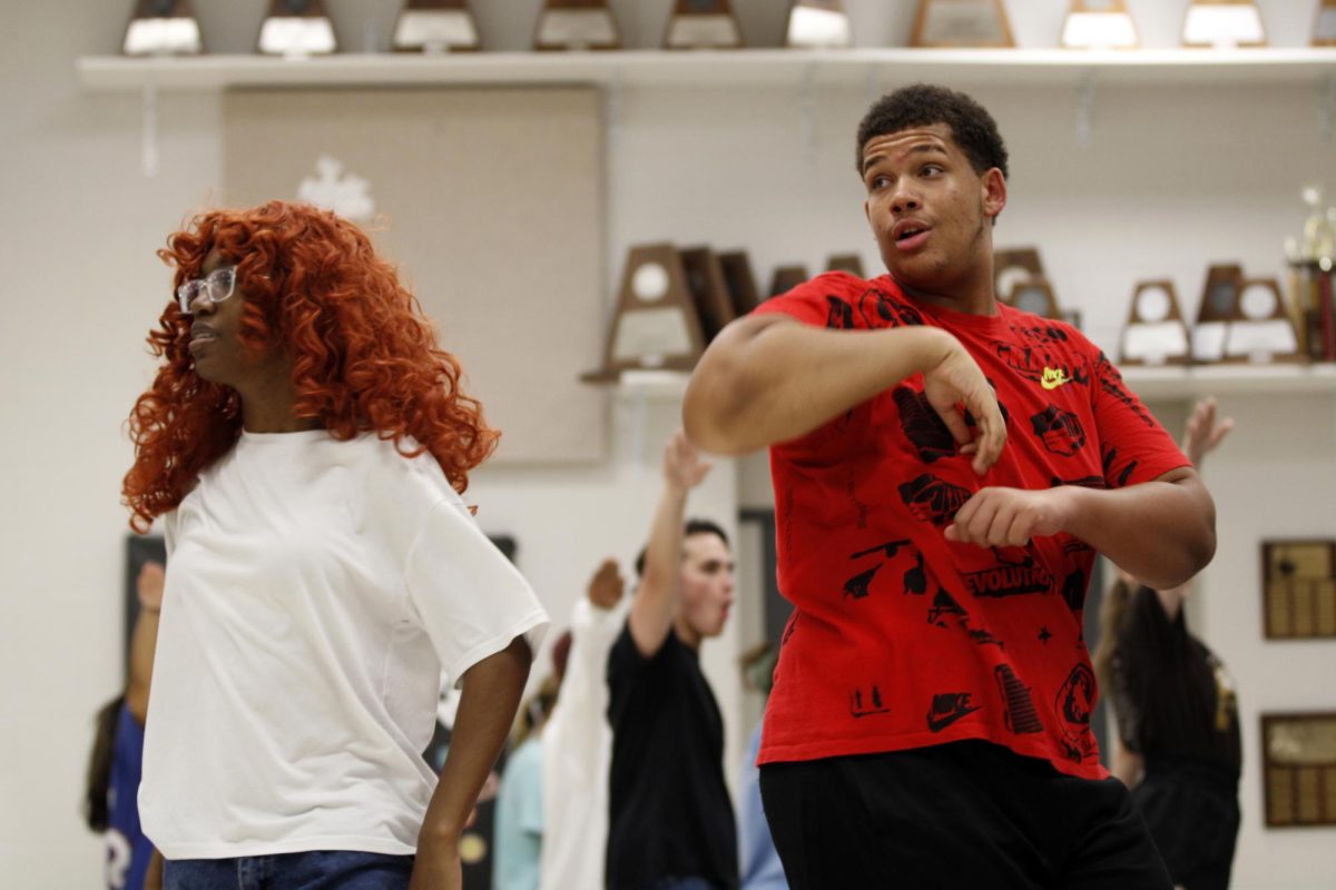 Brynden Kelly, 11, practices a routine in show choir. In addition to show choir, Kelly is on the football team and participates in theater.