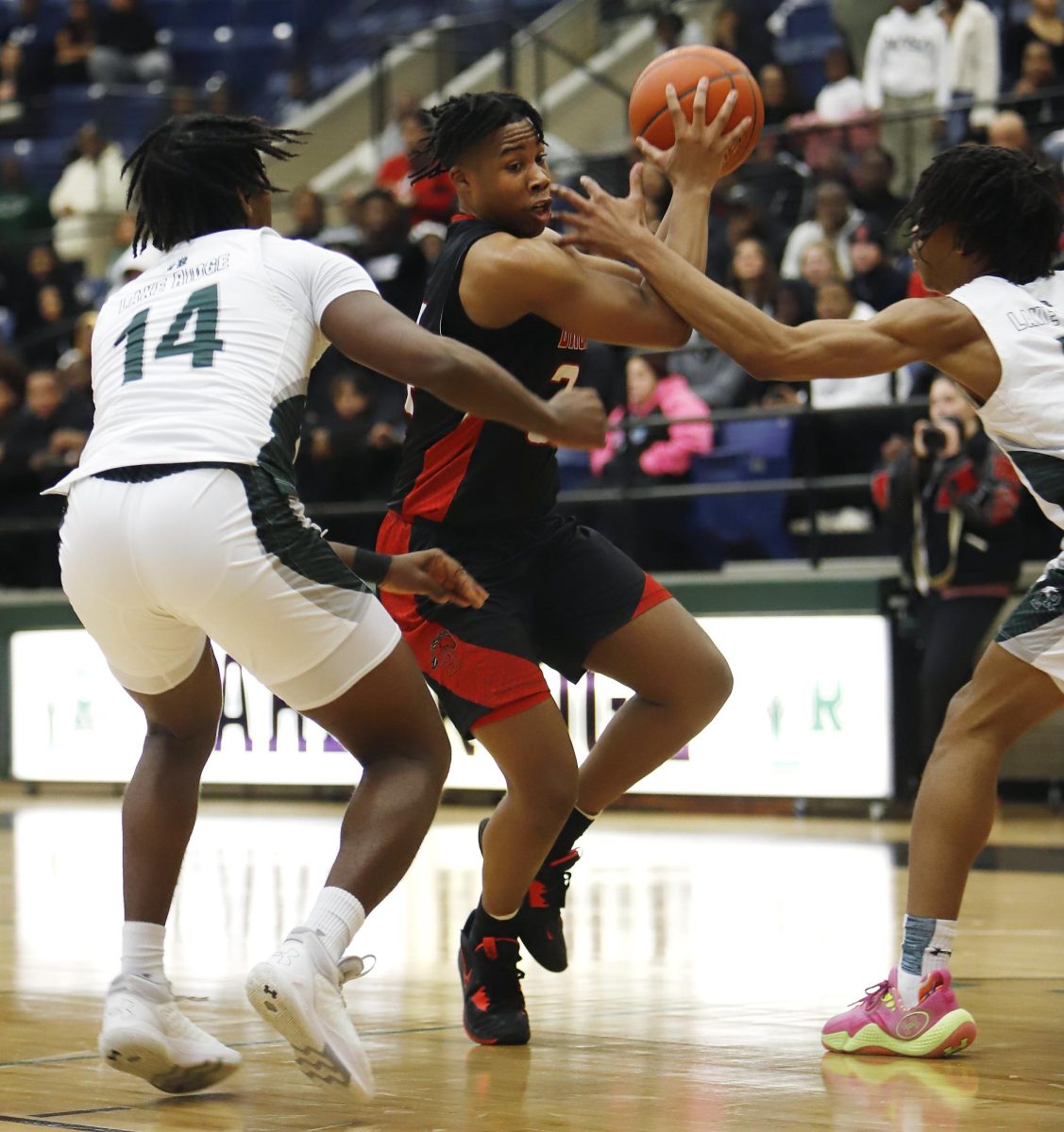Braylen Smith, 12, drives to the basket against Lake Ridge on Jan. 12. Legacy lost 54-70.