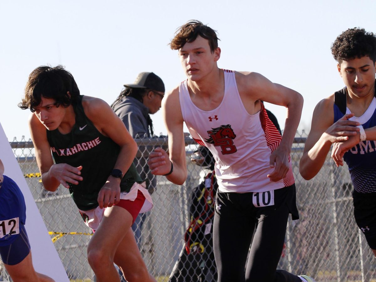 Colten+Thompson%2C+11%2C+competes+at+the+Mansfield+Invitational+track+meet+Feb.+17%2C+2023.+%5BFile+Photo%5D