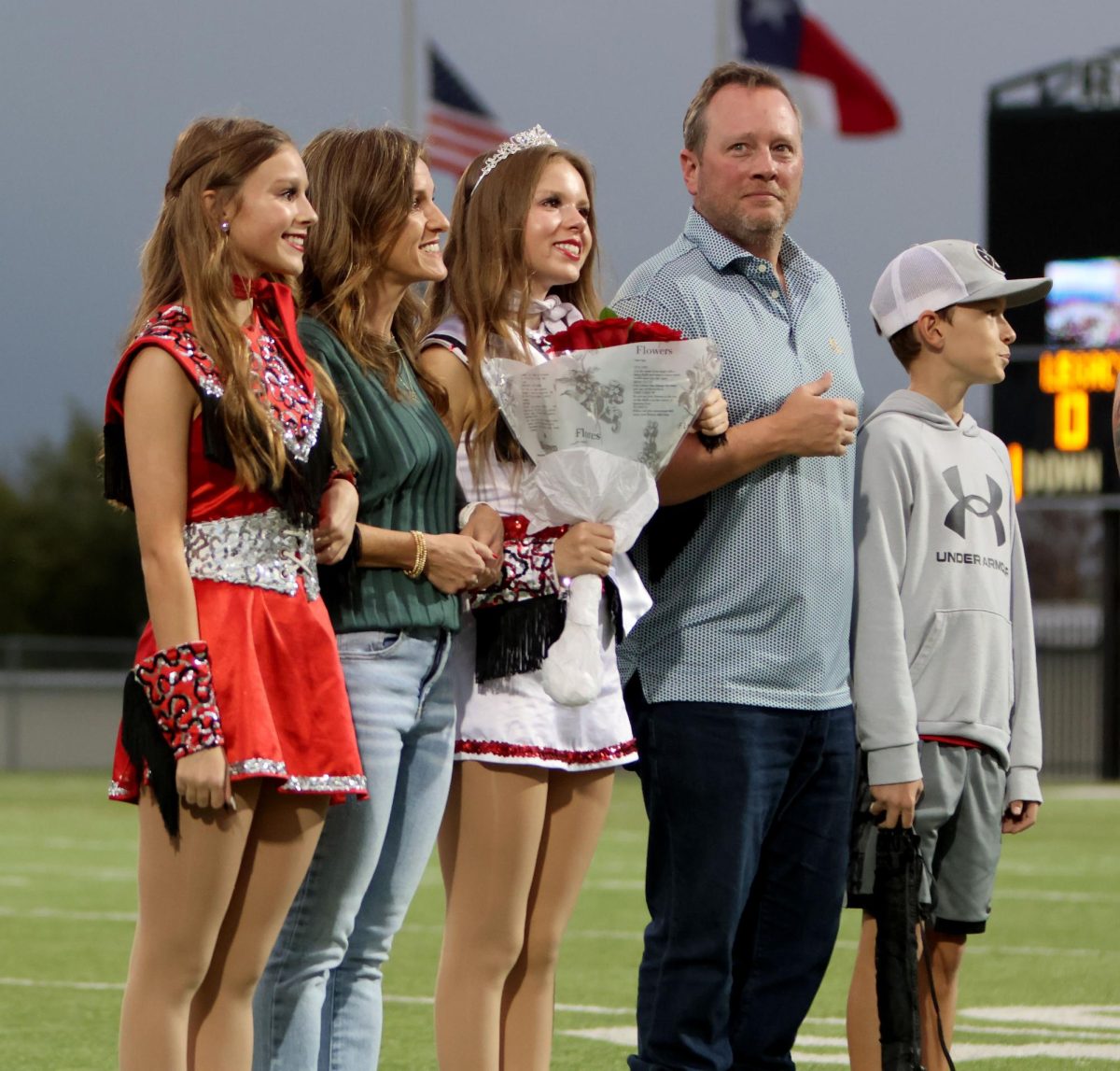 Senior Keira Howard stands with her family at Senior Night during the Oct. 2 game against Cedar Hill.