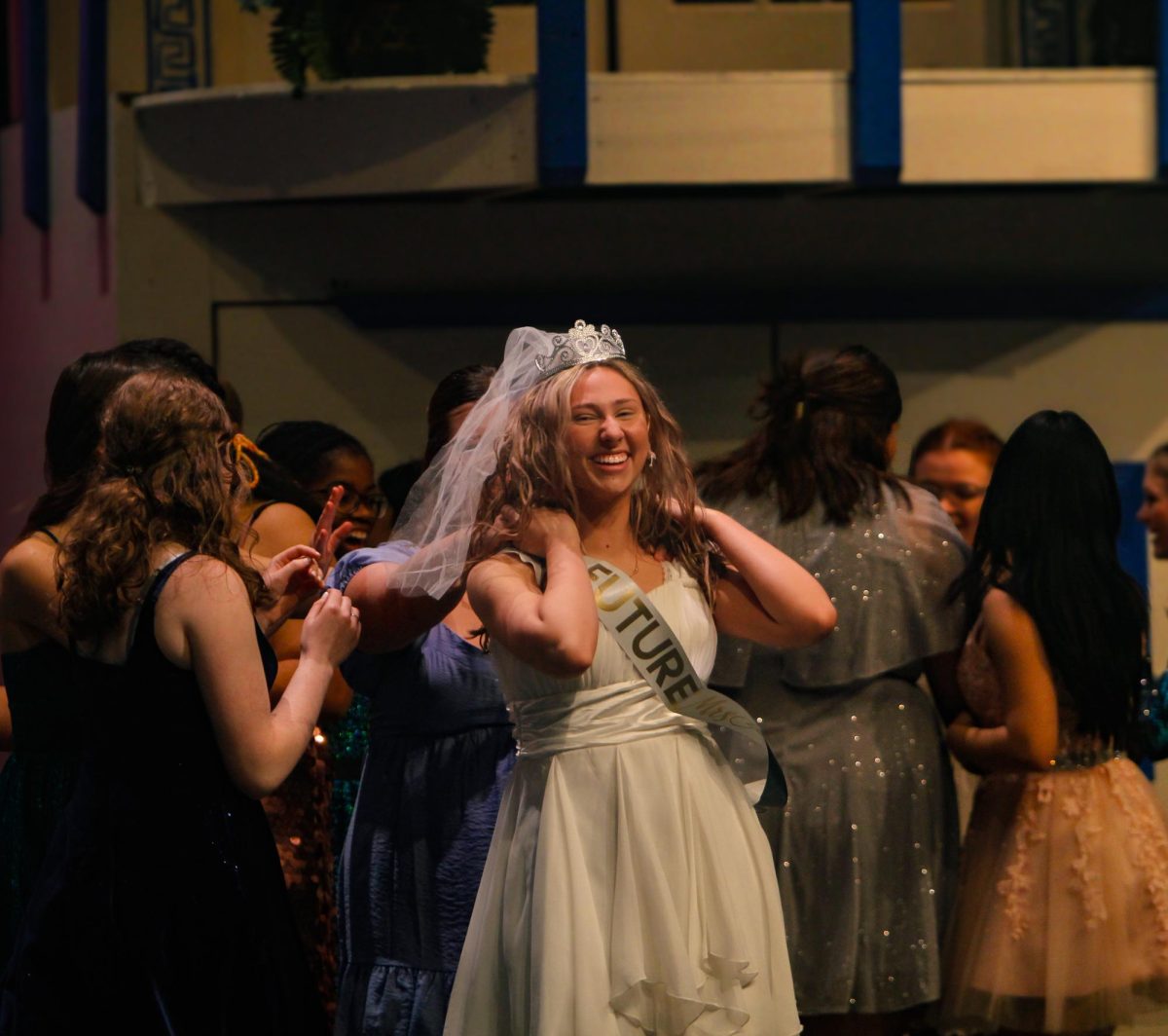 Sophomore Molly Aldridge smiles during the Jan. 17 performance of Mamma Mia! Aldridge played the lead, Sophie, in the show.